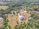 Expansive aerial view of a distinguished home on a large lot surrounded by lush landscaping and mature trees at 2740 Bountiful Pl, Lawrenceville, GA 30045