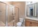 Bathroom boasting a glass-enclosed shower, granite countertop, and modern design at 2740 Bountiful Pl, Lawrenceville, GA 30045