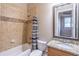 Bathroom showcasing tiled walls, granite countertops, and sleek fixtures at 2740 Bountiful Pl, Lawrenceville, GA 30045