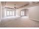 Open bedroom features large windows and tray ceiling; offers natural light and space at 2740 Bountiful Pl, Lawrenceville, GA 30045