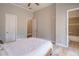 Bedroom with en suite bathroom and tiled floors at 2740 Bountiful Pl, Lawrenceville, GA 30045