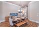 Open dining room with elegant chandelier and view into other living spaces at 2740 Bountiful Pl, Lawrenceville, GA 30045