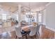 Open-concept dining room showcasing hardwood floors and coffered ceilings at 2740 Bountiful Pl, Lawrenceville, GA 30045
