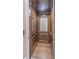 Private elevator featuring hardwood interior, providing easy access to all levels of the home at 2740 Bountiful Pl, Lawrenceville, GA 30045
