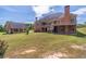 Beautiful brick home featuring a large backyard and a detached garage in a landscaped yard at 2740 Bountiful Pl, Lawrenceville, GA 30045