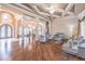 Open great room with a gym area, formal living, coffered ceilings, and elegant foyer, perfect for entertaining at 2740 Bountiful Pl, Lawrenceville, GA 30045