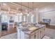 Kitchen island featuring a granite countertop with open floor plan at 2740 Bountiful Pl, Lawrenceville, GA 30045