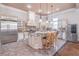 Gourmet kitchen with stainless steel appliances, custom cabinetry, and large center island with seating at 2740 Bountiful Pl, Lawrenceville, GA 30045