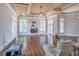 Bright living room with hardwood floors, fireplace, and floor-to-ceiling windows for natural light at 2740 Bountiful Pl, Lawrenceville, GA 30045