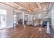 Spacious living room with hardwood floors, coffered ceilings, and an open floor plan at 2740 Bountiful Pl, Lawrenceville, GA 30045
