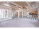 Bright and airy living room with a fireplace and direct access to the open-concept kitchen at 2740 Bountiful Pl, Lawrenceville, GA 30045
