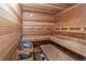 Wooden sauna featuring built-in benches and heater for relaxation and wellness at 2740 Bountiful Pl, Lawrenceville, GA 30045
