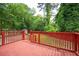 A wooden deck and a lush, green yard, offering privacy and space for outdoor enjoyment at 3479 Thompson Dr, Atlanta, GA 30331
