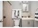 Bathroom featuring tiled shower, vanity with neutral gray cabinets, and tiled backsplash at 3479 Thompson Dr, Atlanta, GA 30331