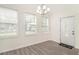 Bright entryway with hardwood flooring, decorative door, and plenty of natural light at 523 Mount Zion, Hapeville, GA 30354