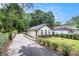 Exterior showcasing vinyl siding and a driveway at 523 Mount Zion, Hapeville, GA 30354