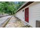 Exterior view showing a red door and vinyl siding at 523 Mount Zion, Hapeville, GA 30354