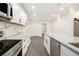 Modern kitchen featuring granite countertops, stainless appliances, and large kitchen island at 523 Mount Zion, Hapeville, GA 30354