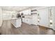 Open-concept kitchen with granite countertops and new stainless-steel appliances at 523 Mount Zion, Hapeville, GA 30354