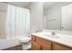 This bathroom features a shower/bathtub combo, toilet and single sink vanity at 841 Holly Meadow Dr, Buford, GA 30518