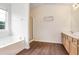 This bathroom features double sinks, a shower, and a bathtub at 841 Holly Meadow Dr, Buford, GA 30518