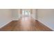 Formal dining room with hardwood floors, wainscoting, and a bay window at 841 Holly Meadow Dr, Buford, GA 30518