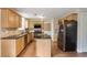 Modern kitchen with granite countertops, stainless steel appliances, and a functional center island at 841 Holly Meadow Dr, Buford, GA 30518