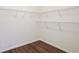 The walk-in closet has plenty of storage with shelving at 841 Holly Meadow Dr, Buford, GA 30518