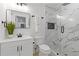 Beautiful bathroom with a modern shower stall, vanity, and mirror at 3614 N Druid Hills N Rd, Decatur, GA 30033
