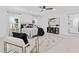 Bright bedroom featuring a ceiling fan, stylish decor, and natural light at 3614 N Druid Hills N Rd, Decatur, GA 30033