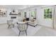 Inviting living room features stylish furnishings, a modern fireplace, and ample natural light from large windows at 3614 N Druid Hills N Rd, Decatur, GA 30033