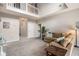 Spacious living room featuring a second floor balcony, neutral paint, and plush carpet at 385 Eagles Nest Cir, Carrollton, GA 30116