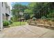 Private backyard with lush landscaping, basketball court and outdoor gazebo, perfect for entertaining at 4085 Hillcrest View Ct, Suwanee, GA 30024