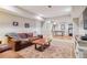Spacious finished basement with a game area and comfortable seating at 4085 Hillcrest View Ct, Suwanee, GA 30024