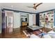 Open living room showcasing wood floors, custom storage, and comfortable seating at 4085 Hillcrest View Ct, Suwanee, GA 30024