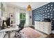 Stylish office space featuring patterned wallpaper, wood floors, and modern decor at 4085 Hillcrest View Ct, Suwanee, GA 30024