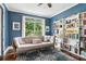 Cozy office features custom bookshelves, natural light, and hardwood floors at 4085 Hillcrest View Ct, Suwanee, GA 30024