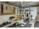 Basement home gym with weight rack, bench, and exercise equipment at 5524 Wedgewood Sw Ct, Lilburn, GA 30047