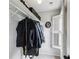 Organized walk-in closet with shelves, clothes racks, and a bright window with white shutters at 5524 Wedgewood Sw Ct, Lilburn, GA 30047
