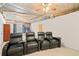 Unfinished basement featuring four recliners and a partially finished ceiling at 735 Amberton Close, Suwanee, GA 30024