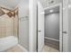Modern bathroom with a tiled shower-tub combination at 113 Tuxworth Cir, Decatur, GA 30033