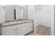 Bathroom showcasing granite countertops, modern cabinets, and a walk-in closet at 113 Tuxworth Cir, Decatur, GA 30033