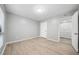 Bedroom featuring luxury vinyl floors, recessed lighting, and a walk-in closet at 113 Tuxworth Cir, Decatur, GA 30033