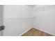Walk-in closet features modern floors and built-in shelving at 113 Tuxworth Cir, Decatur, GA 30033