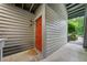 Exterior image shows the front door of unit #113 with neutral siding at 113 Tuxworth Cir, Decatur, GA 30033