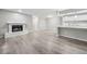 Open concept living area with hardwood floors, fireplace and updated kitchen at 113 Tuxworth Cir, Decatur, GA 30033
