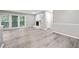 Spacious living room with fireplace, access to the balcony and neutral finishes throughout at 113 Tuxworth Cir, Decatur, GA 30033