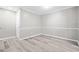 A cozy room features neutral paint, hardwood floors and white trim at 113 Tuxworth Cir, Decatur, GA 30033