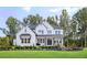 Stunning two-story home with a well-manicured lawn and lush landscaping at 2465 Bleckley Pl, Cumming, GA 30041
