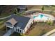 Aerial view of the community pool area with a lounge and pergola at 2929 Rambler Dr, Loganville, GA 30052